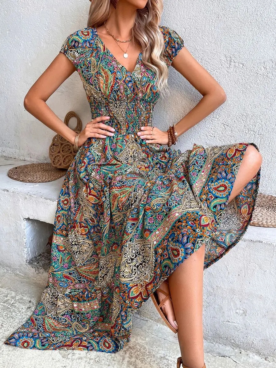 Moteriška maxi suknelė V formos iškirpte aukštu liemeniu su boho raštu