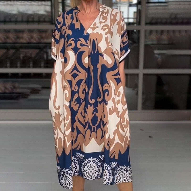 Vestido midi solto estampado gola alta