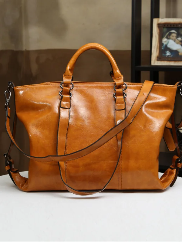 Handmade shiny leather handbag