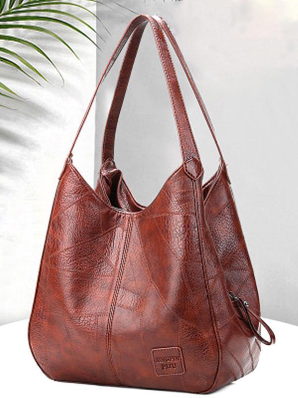 Bolsa de ombro feminina de grande capacidade em couro macio e retrô