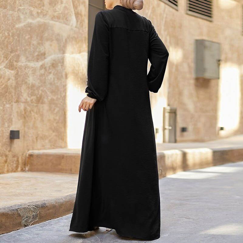 Vestido solto com bolsos e zíper
