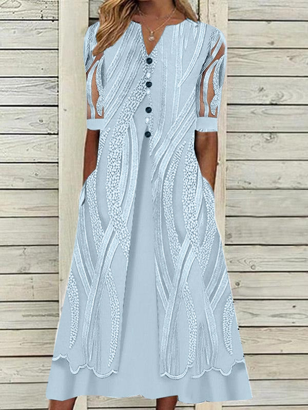V-nyakú nyomott bő, rövid ujjú elegáns ruha