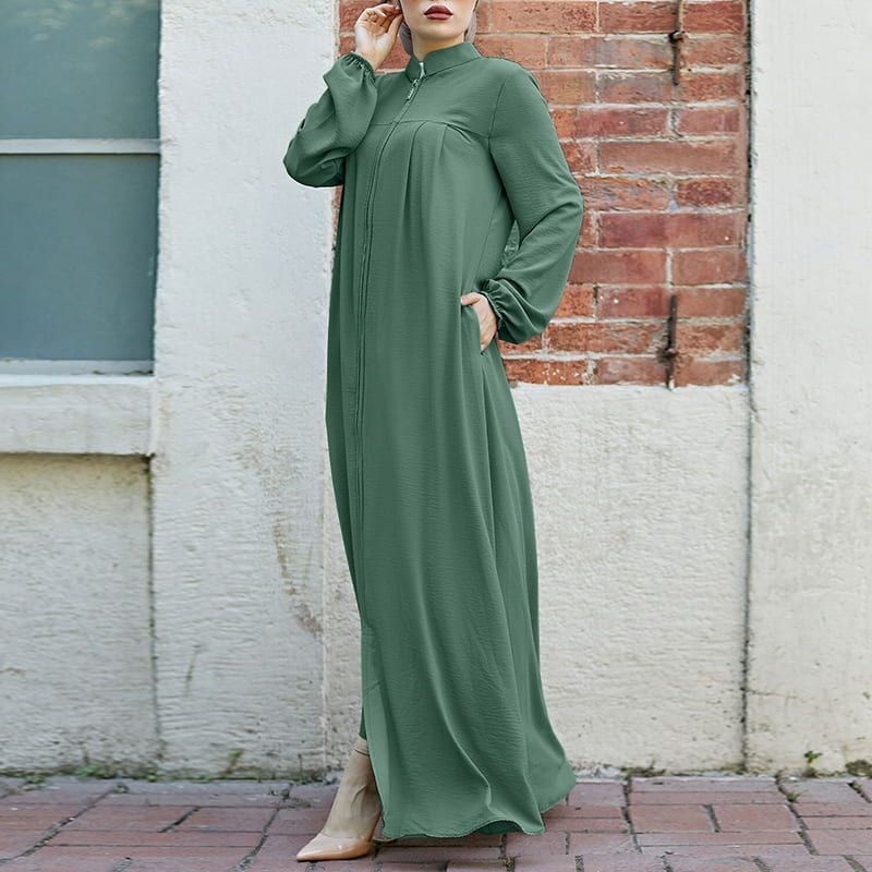 Vestido solto com bolsos e zíper
