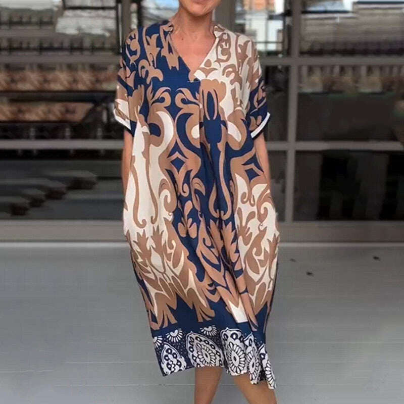 Vestido midi solto estampado gola alta
