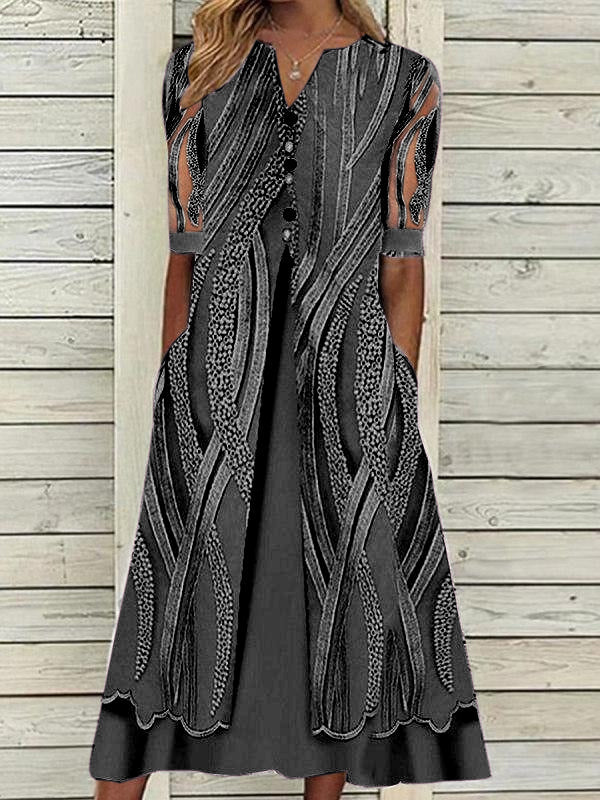 V-nyakú nyomott bő, rövid ujjú elegáns ruha