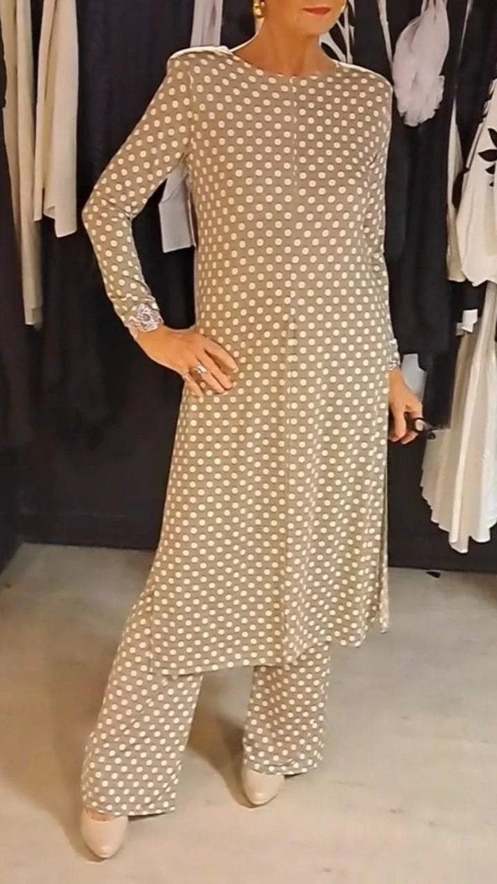 Tuta da donna con stampa a pois e maniche lunghe e scollo tondo