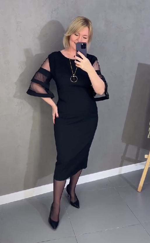 Elegantna haljina od tila koja se kopča patentnim zatvaračem