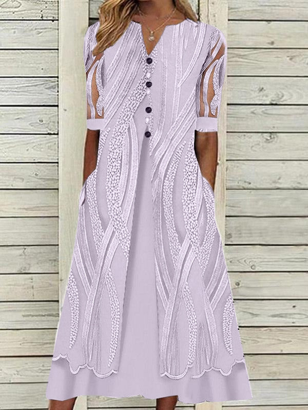 V-nyakú nyomott bő, rövid ujjú elegáns ruha