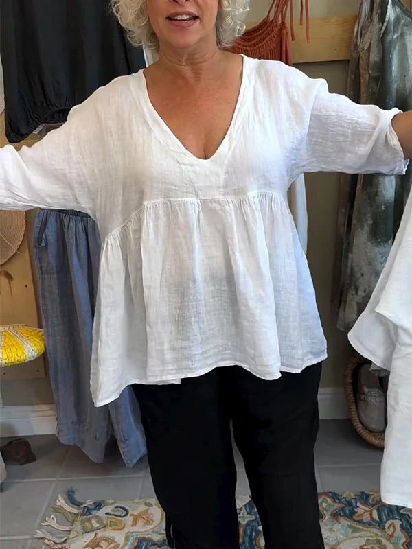 Top in cotone e lino con scollo a V profondo plissettato tinta unita e maniche a tre quarti