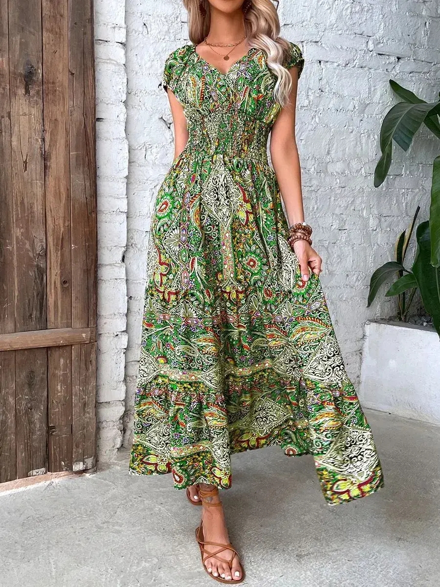 Moteriška maxi suknelė V formos iškirpte aukštu liemeniu su boho raštu
