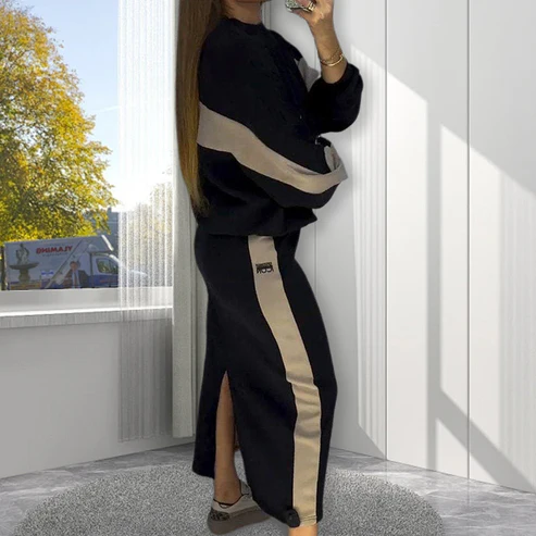 Completo top a maniche lunghe colorblock e gonna spaccata