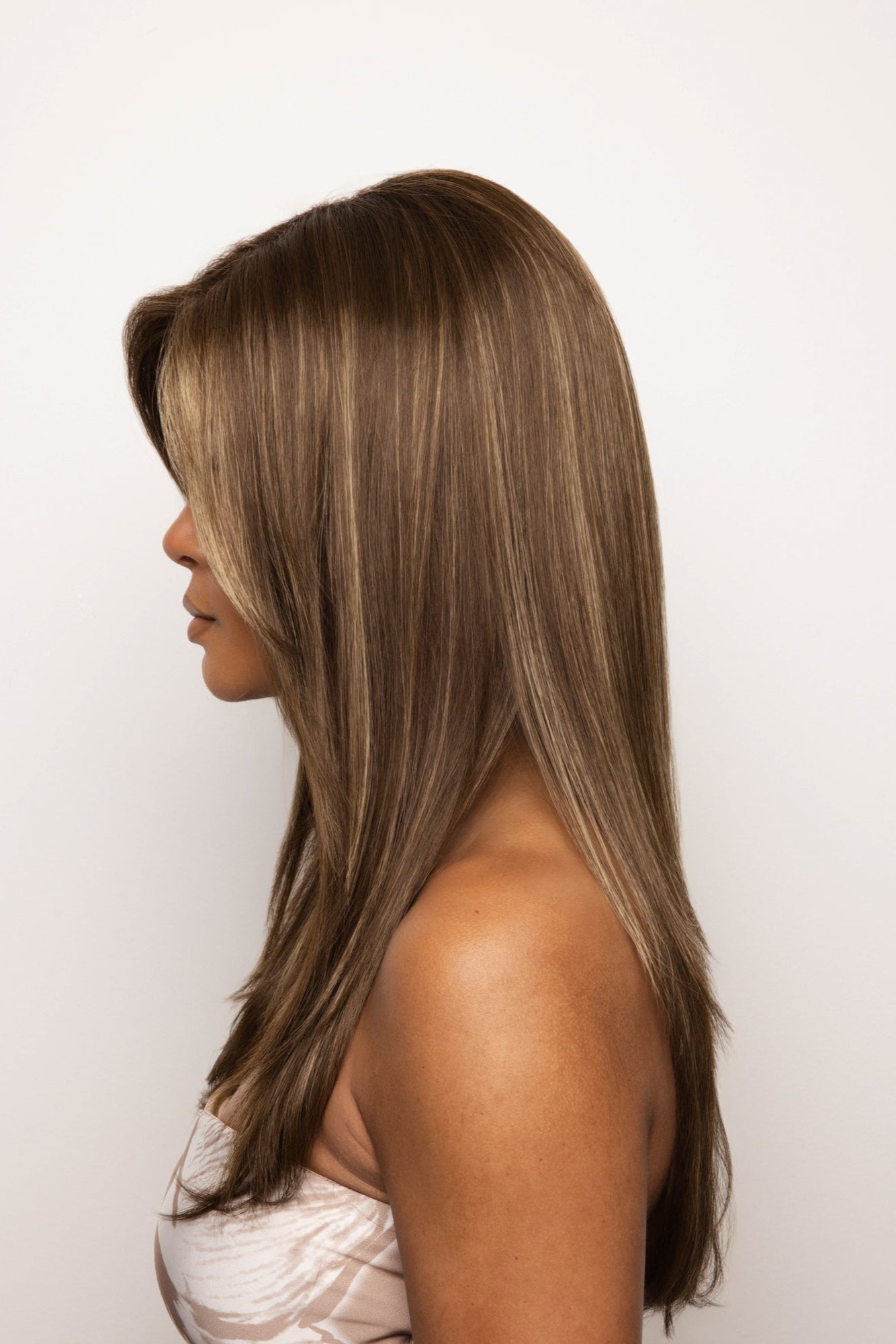 Highlighted side-parted long straight hair