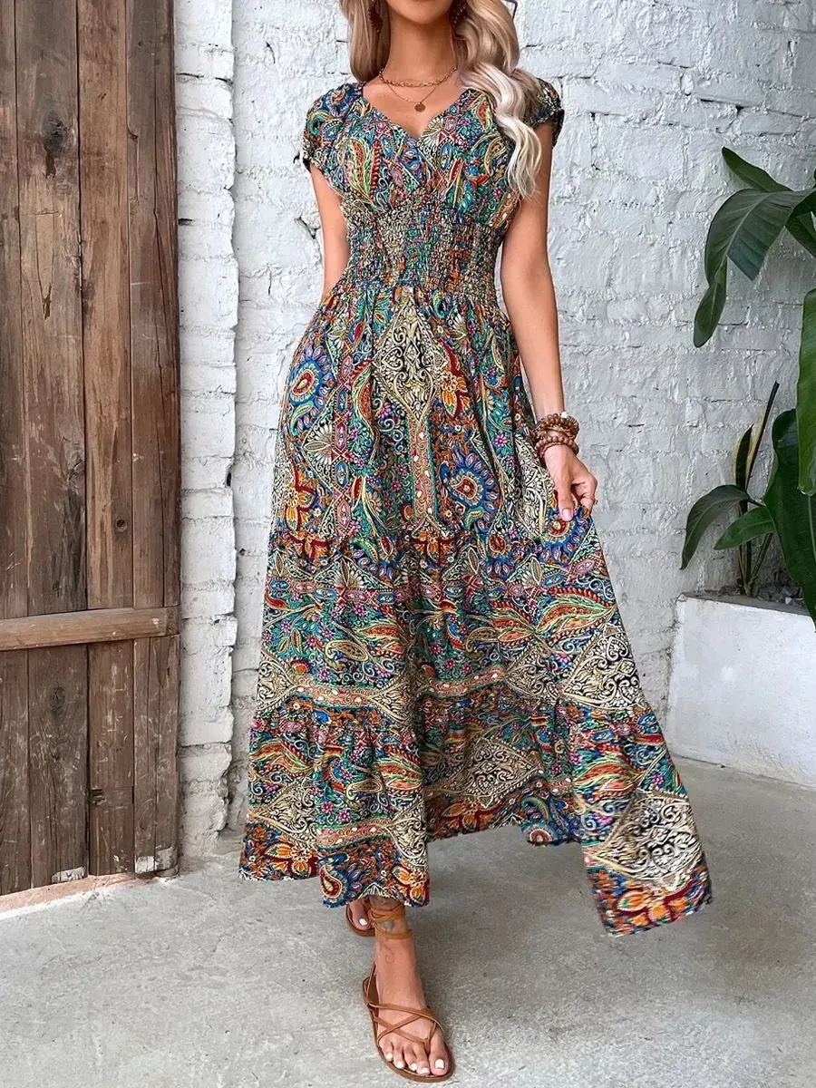 Moteriška maxi suknelė V formos iškirpte aukštu liemeniu su boho raštu