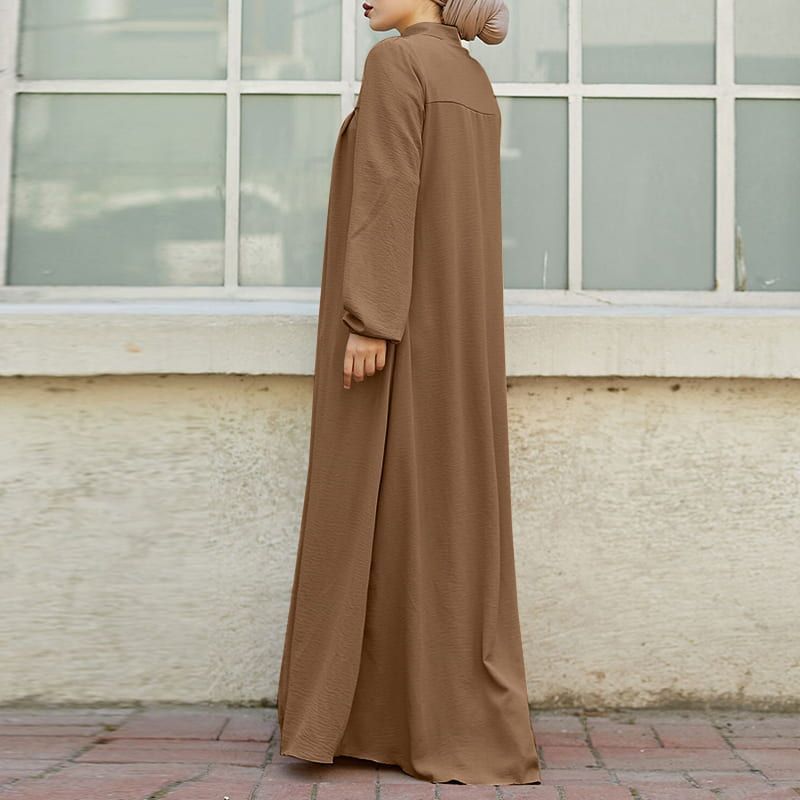 Vestido solto com bolsos e zíper