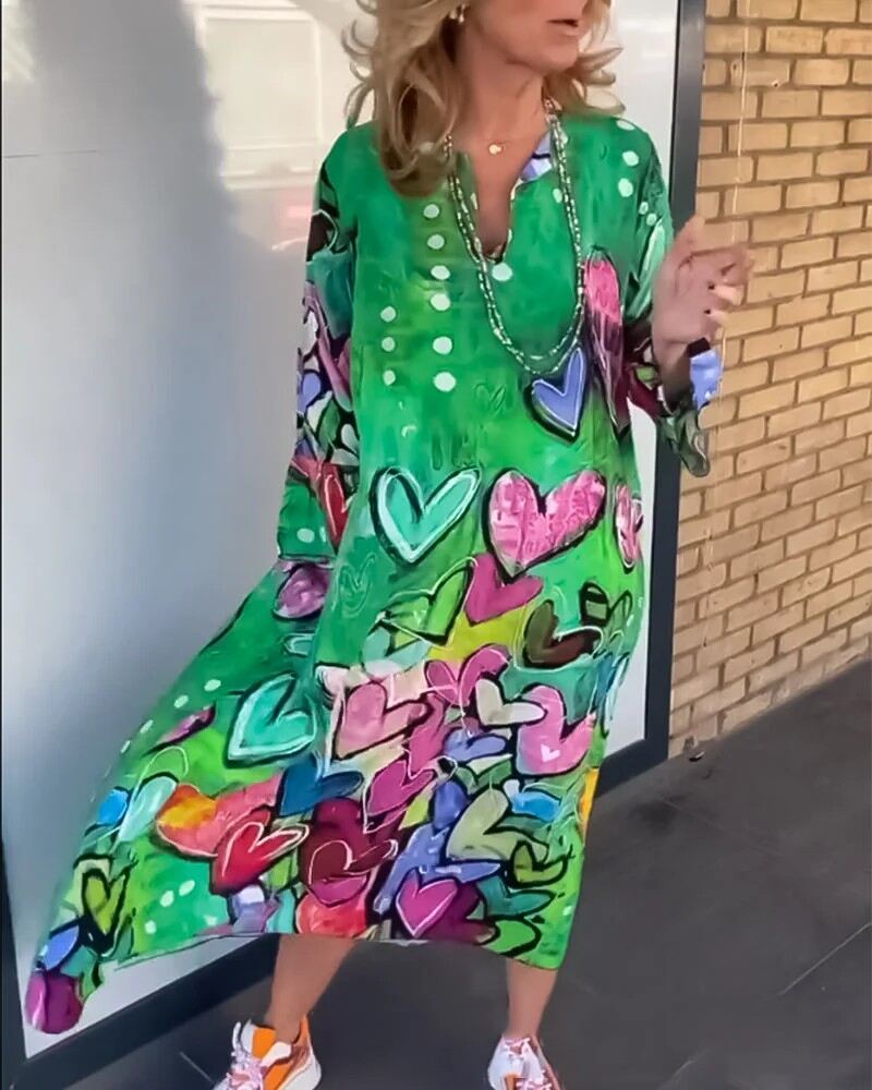 Long sleeve dress with heart print and V-neck