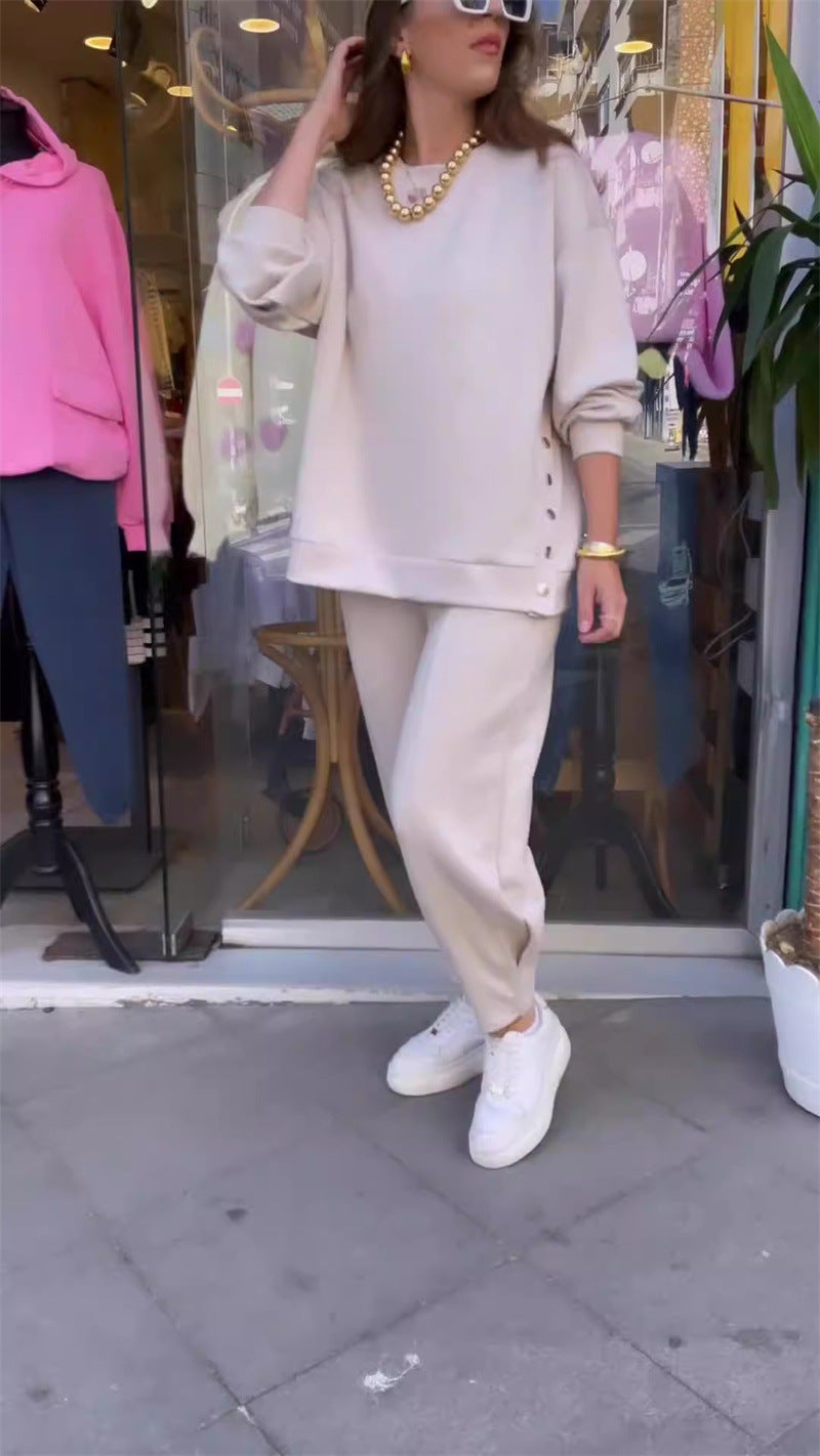 Elegantiškas dviejų dalių užsegamo palto ir kelnių komplektas