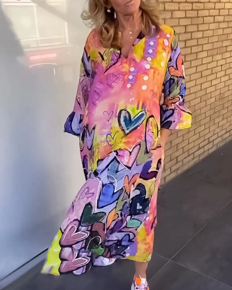 Long sleeve dress with heart print and V-neck