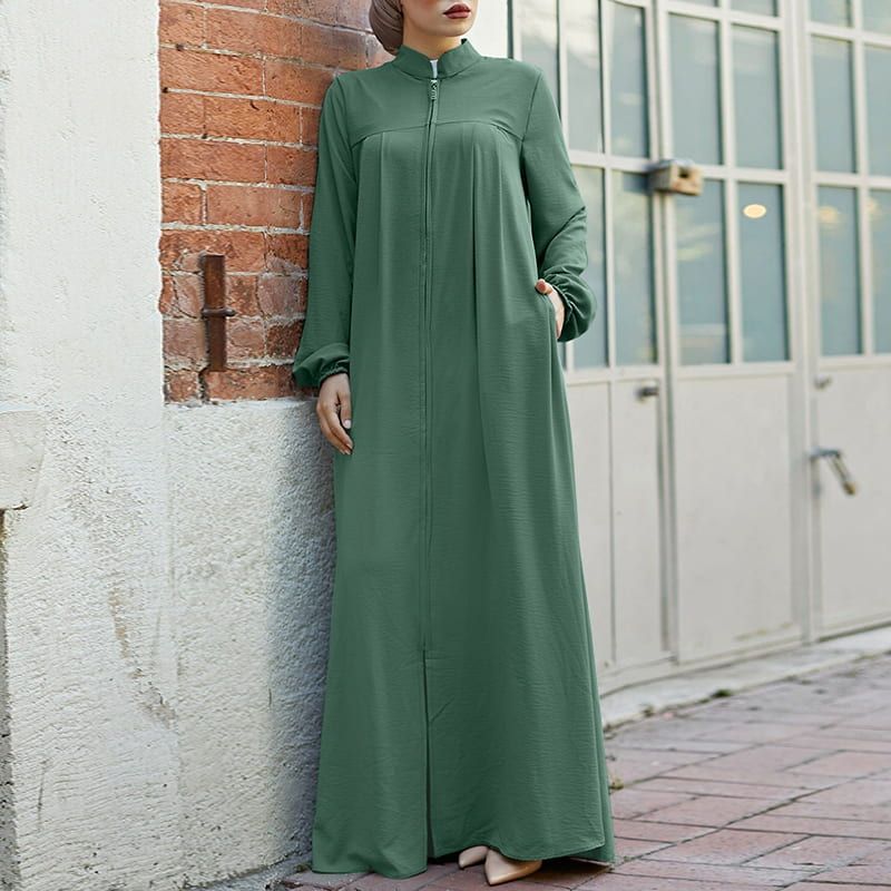 Vestido solto com bolsos e zíper
