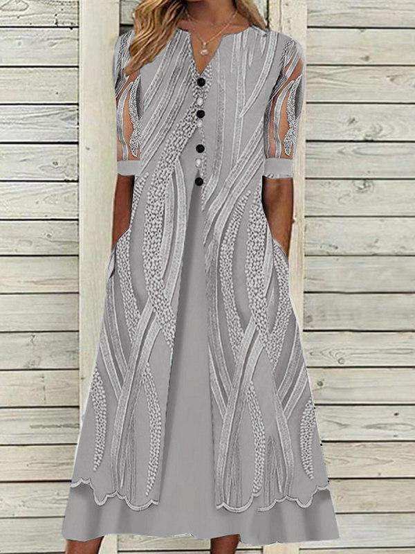 V-nyakú nyomott bő, rövid ujjú elegáns ruha